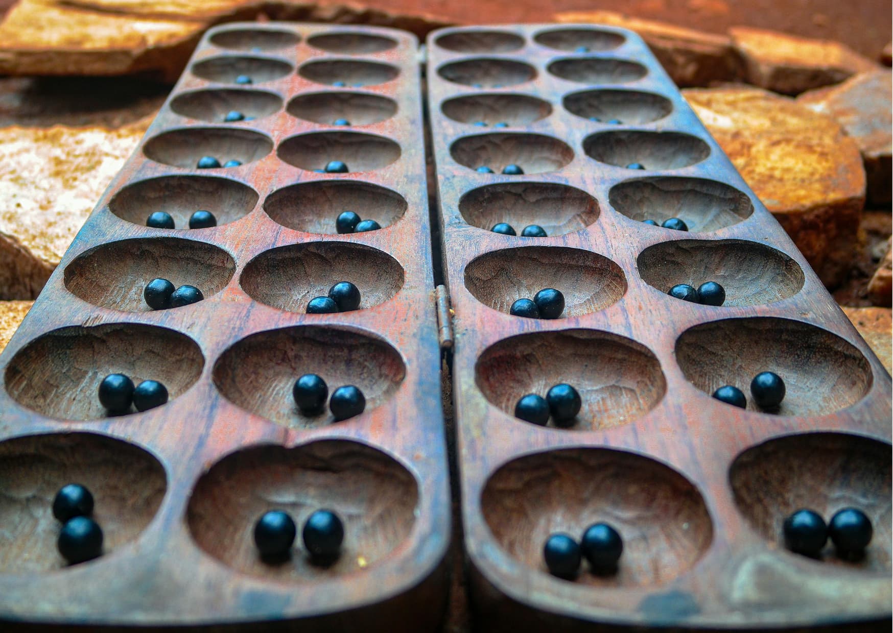 Omweso, Uganda's traditional wooden board game
